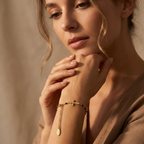Golden Beaded Cross Bracelet